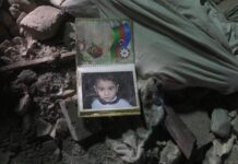 Gəncədə dağıntılar altından 52 yaralı və 13 meyit çıxarılıb gence-terror-daginti